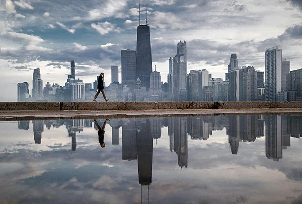 A photo of a skyline shot of a city from the water.